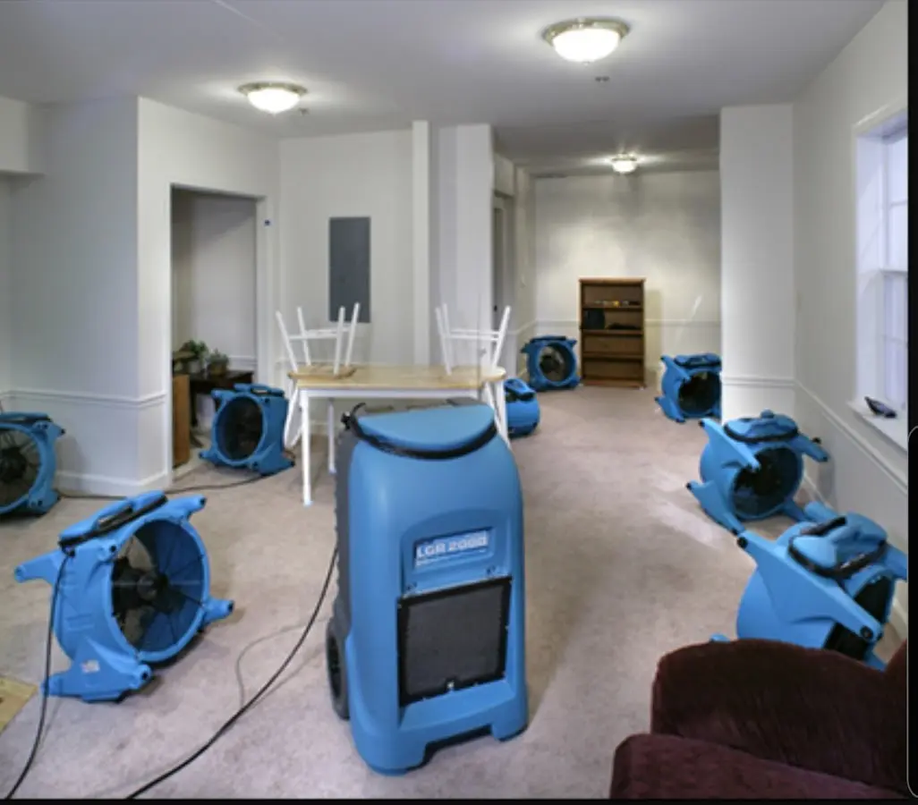 Air movers and dehumidifier setup for Water Damage Restoration in Marshall